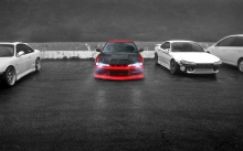 Красный Nissan Silvia/SX среди белых коллег